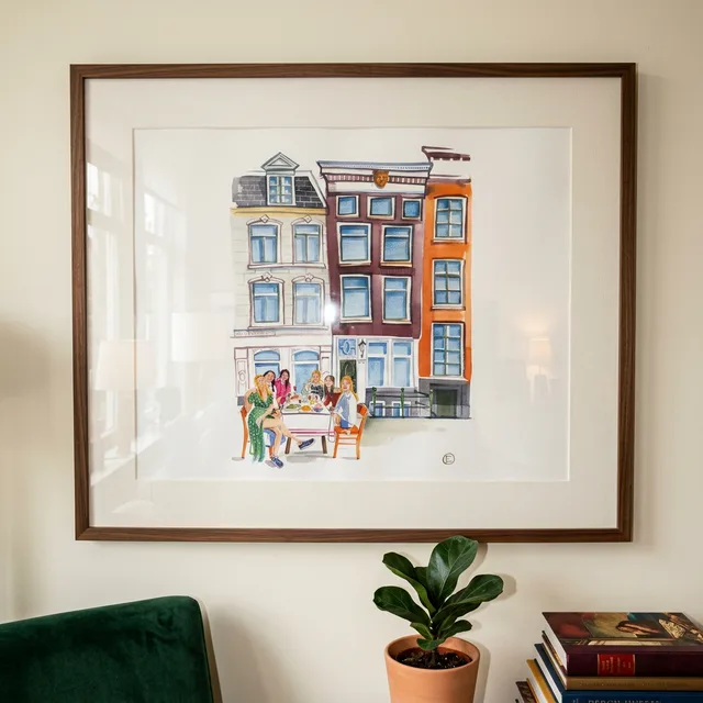 Huisportret met mensen aan de zomertafel